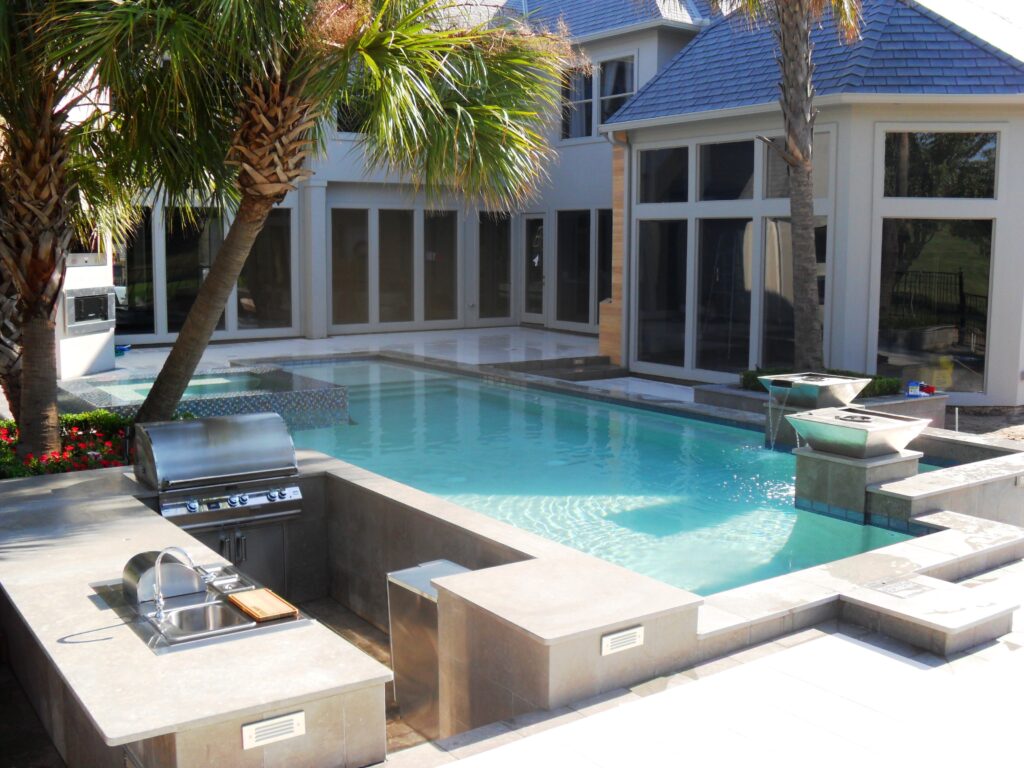Custom geometric pool in Stonebriar by H2 Outdoor Design

