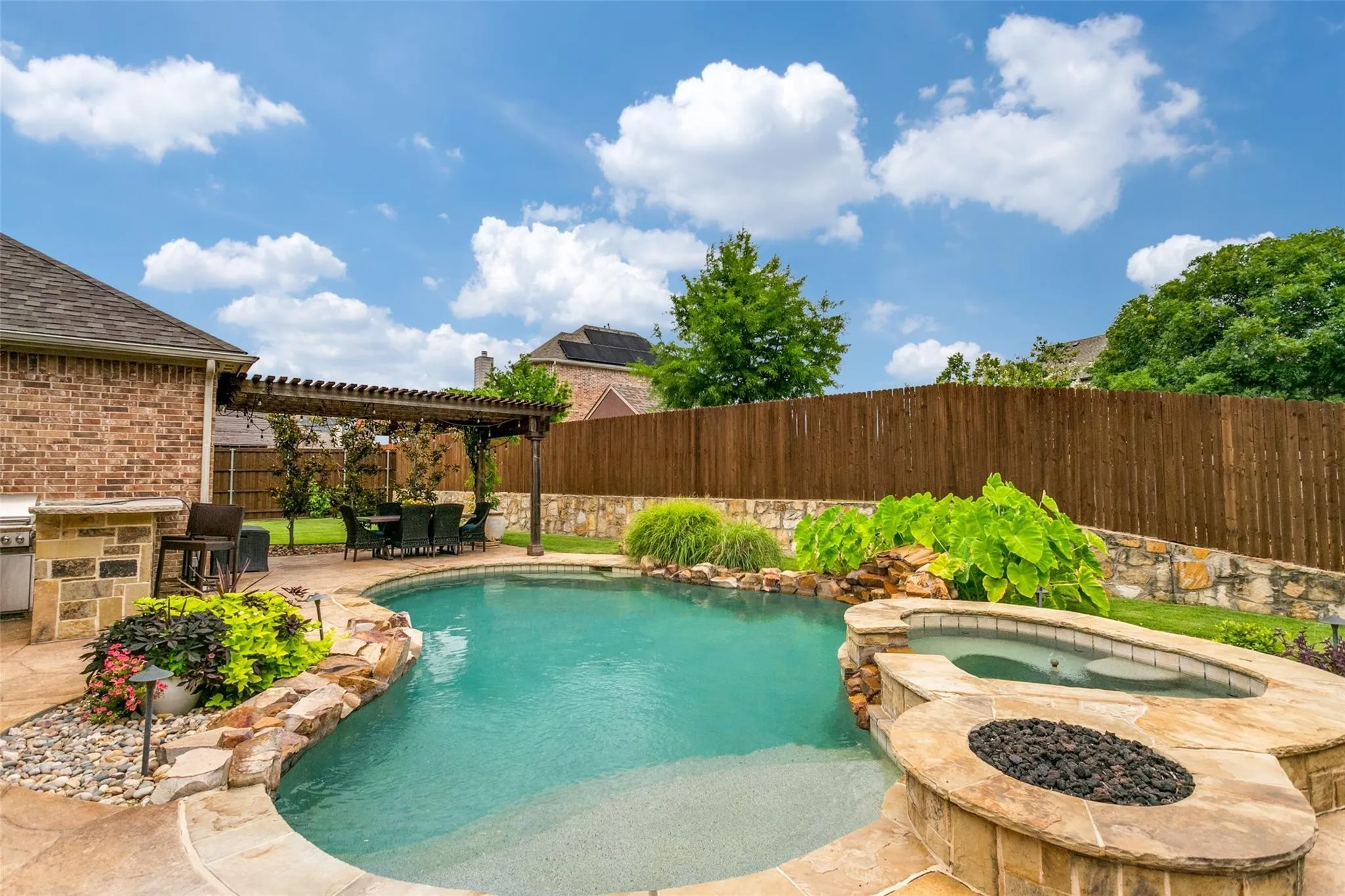 Natural pool with firepit