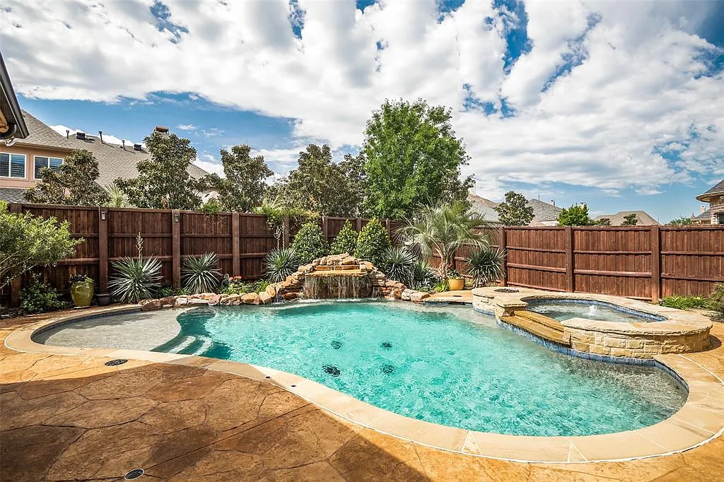 Custom natural pool with waterfall in DFW area