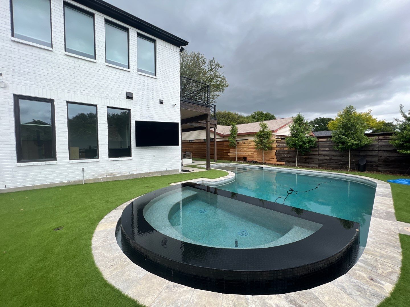 Before and after of pool renovation by H2 Outdoor Design
